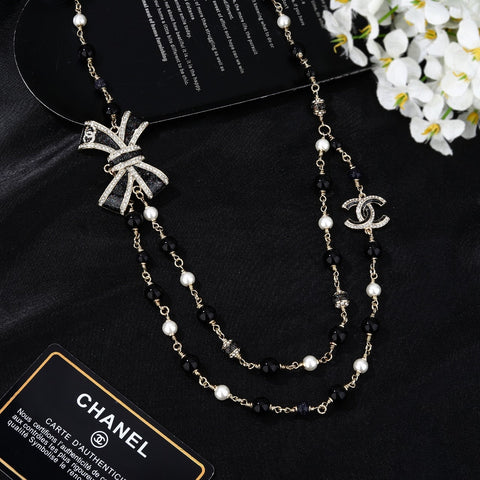 CHANEL 25S CHAIN BELT IN BLACK AND WHITE PEARL 614285
