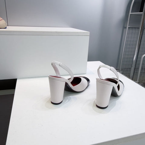CHANEL 26S SLINGBACK 95 MM IN WHITE LAMBSKIN WITH BLACK CAP TOE