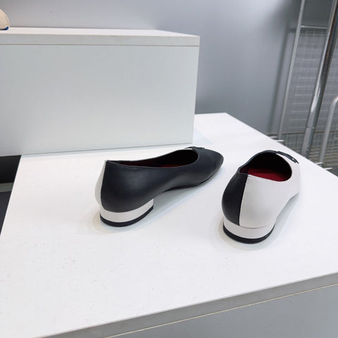 CHANEL 26S SQUARE-TOE FLATS IN BLACK AND WHITE LAMBSKIN