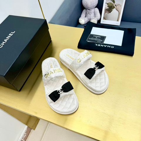 DAD SANDALS WITH BOW IN WHITE LAMBSKIN MULE
