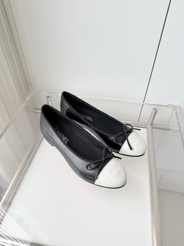 CHANEL 26S BALLET FLATS IN BLACK CRACKED CALFSKIN WITH WHITE TOE CAP AND BOW