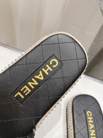 WOVEN STRAP SLIPPERS IN BLACK LAMBSKIN