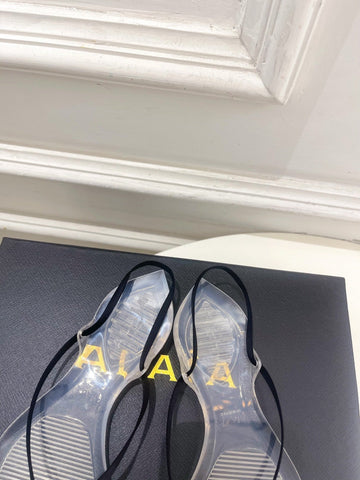 ALAIA 26S POINTED-TOE THONG SANDALS IN BLACK SATIN AND TRANSPARENT PVC