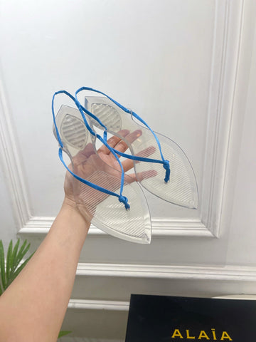 ALAIA 26S POINTED-TOE THONG SANDALS IN BLUE SATIN AND TRANSPARENT PVC