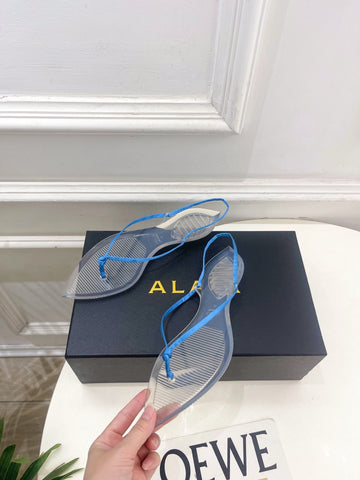 ALAIA 26S POINTED-TOE THONG SANDALS IN BLUE SATIN AND TRANSPARENT PVC